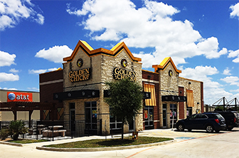 Golden Chick storefront.  Your local Golden Chick fast food restaurant in La Vernia, Texas