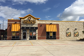 Golden Chick storefront.  Your local Golden Chick fast food restaurant in Garland, Texas