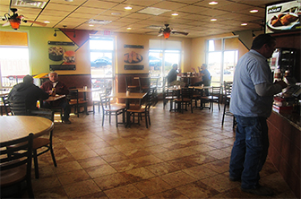 Golden Chick storefront.  Your local Golden Chick fast food restaurant in Ballinger, Texas